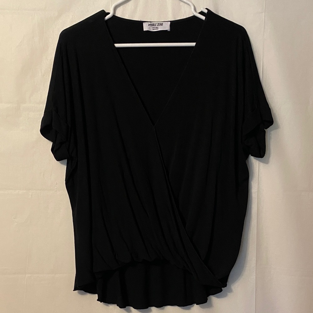 Double Zero Black Draped Surplice Short Sleeve Top. Cuffed sleeve. High low hem.